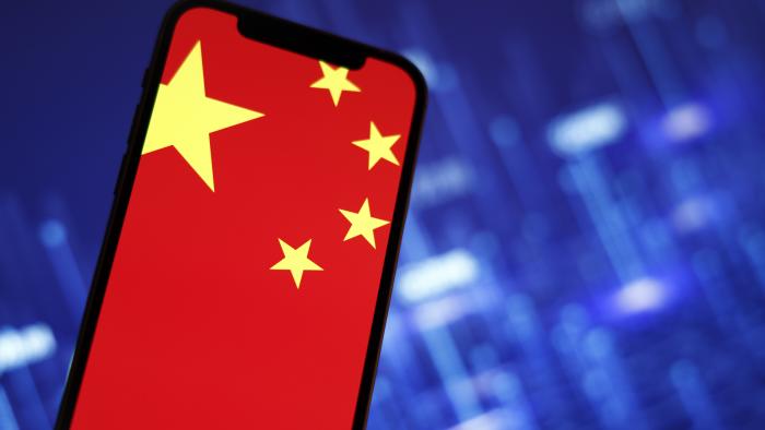 The Chinese flag is seen on a mobile phone in this photo illustration in Warsaw, Poland on 27 September, 2022. (Photo By 澳洲幸运10开奖官网开奖结果 STR/NurPhoto via Getty Images)